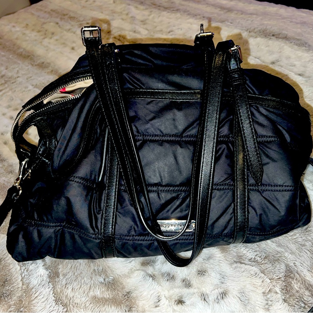 Nylon Burberry Baby Bag with leather straps. Used but immaculate inside.